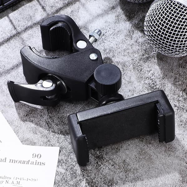 Justerbart mikrofonstativ telefonholder med roterbart ledd og puter