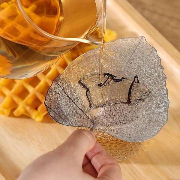 4 stk. te-infuser-sæt i rustfrit stål med bladformede si