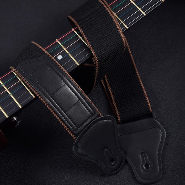 Praktisk svart bomullsrem för ukulele och gitarr med anti-stretch-funktion