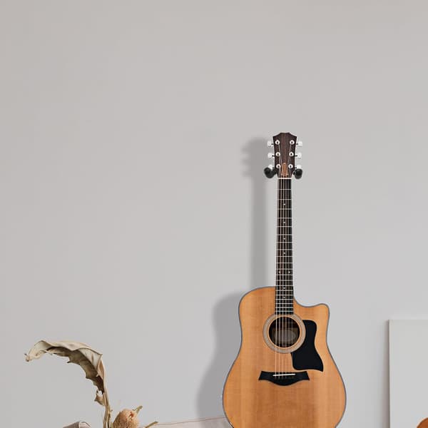 Gitarrväggfäste med metallkonstruktion och svampvaddering