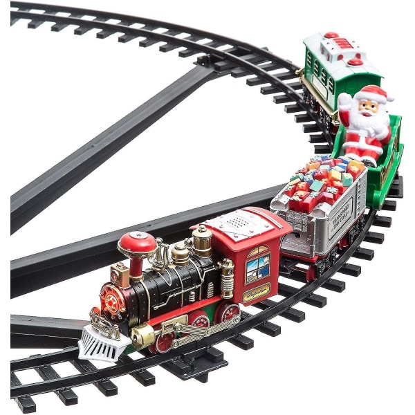 jultåg i mitten av julgranen Batteridrivet tåg, julmelodi, juldekorationer Tåget kommer