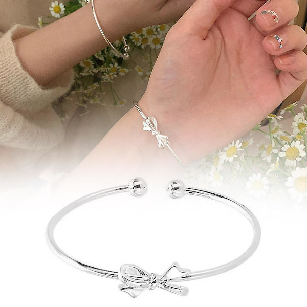 Silvrigt justerbart armband med rosett och pärlberlock (A)