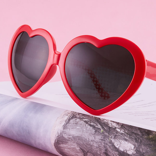 3D-hjärtformade glasögon som förvandlar ljus till en hjärtform Rosa