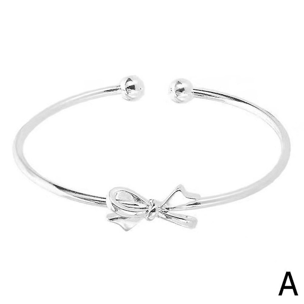 Silvrigt justerbart armband med rosett och pärlberlock (A)