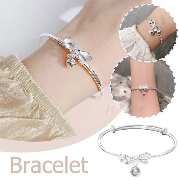 Silvrigt justerbart armband med rosett och pärlberlock (A)