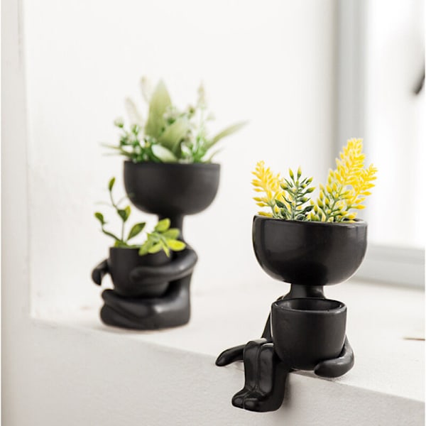 Keramisk planter i form av en sittande människa - Dekoration för hem och kontor - Håller en skål i ena handen - Svart