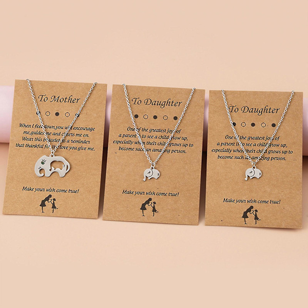 Halsband med elefantberlock till mor och dotter, symboliserar lycka och styrka