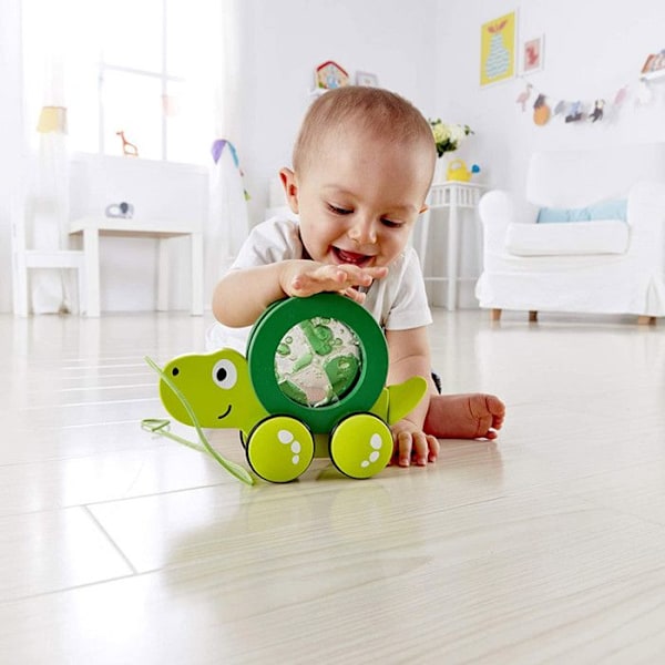 Hape - Tito grön dragleksak Ljusgrön