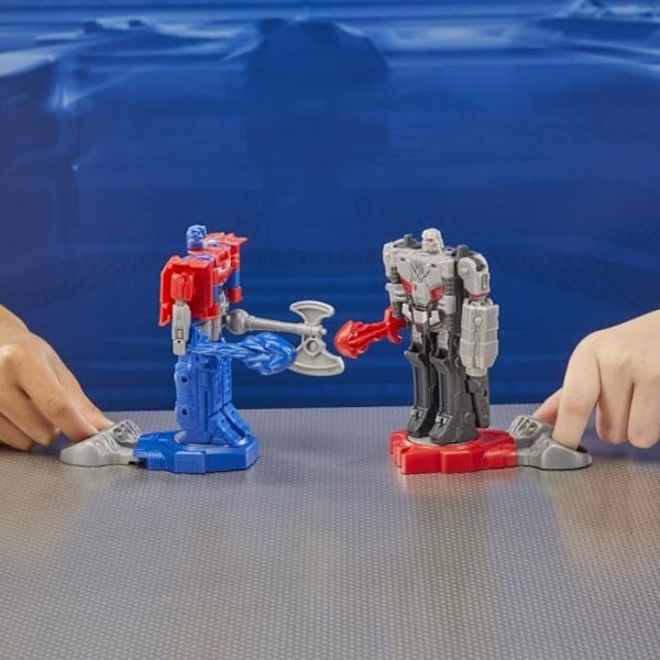 Pakkauksessa 2 kpl Optimus Prime (Orion Pax) ja Megatron (D-16) 11 cm figuuria, leluja 6 vuoden iästä alkaen, Transformers One Robot Batttlers Flerfärgad