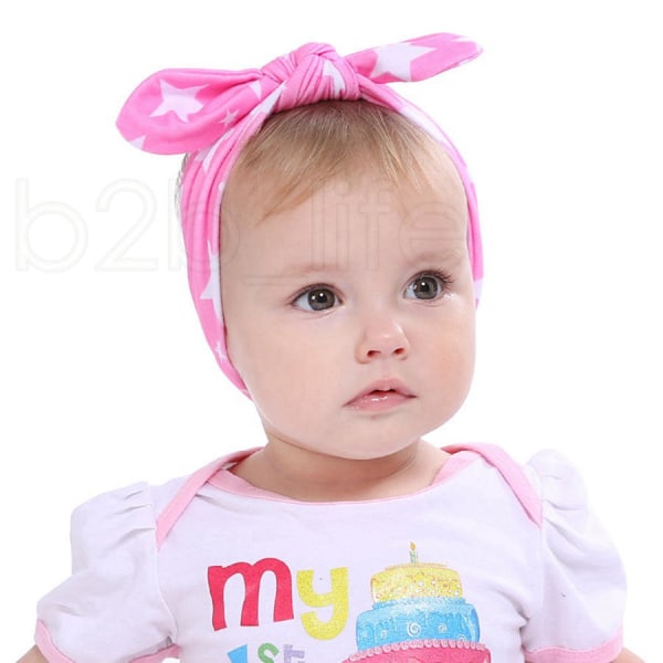 Hårband barn rosa med vita stjärnor one size