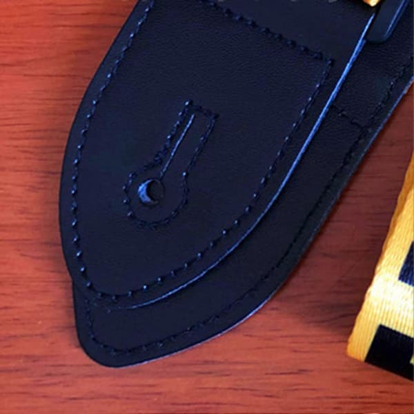 Universell gitarrrem för elgitarrer och ukulele - Polyester PU-läder, gult bokstavsmönster
