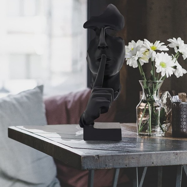 Stilhed er guld tænker statue abstrakt kunst harpiks figur sort