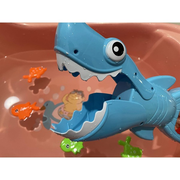 Baby haj med 4 leksaksfiskar