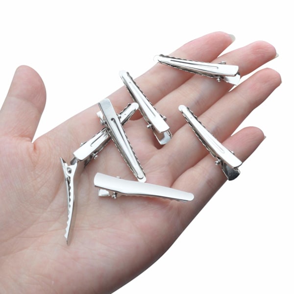 34MM pienet alligaattorin hiuspidikkeet, 100 kappaletta hopeanväriset metalliset alligaattorin hiusneulat hampaat jouset krokotiilin hiuspidikkeet pidikkeet tarvikkeet 34MM