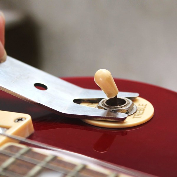 1 gitarrbas bärbart verktyg i rostfritt stål gitarrbrytare