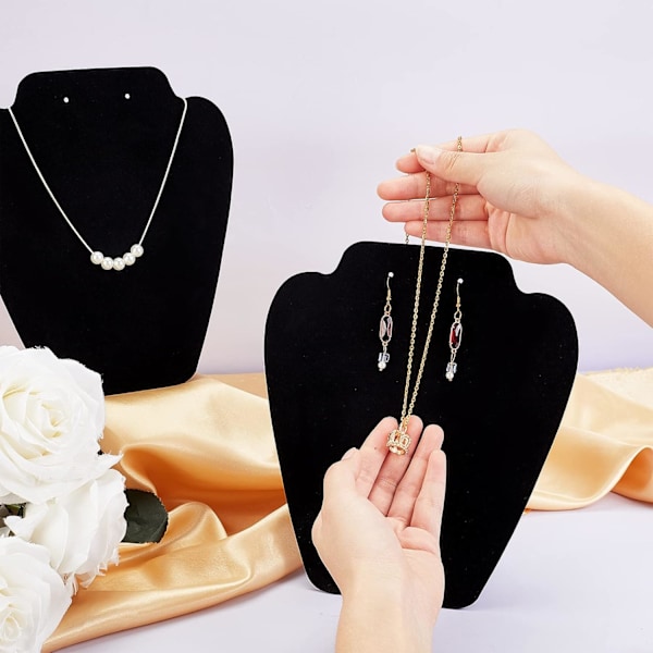 2 stycken svarta sammetsklädda örhängen halsband displayställ papper