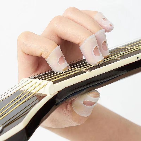 8 stycken gitarrfinger skydd i silikon, halkfria finger skydd för
