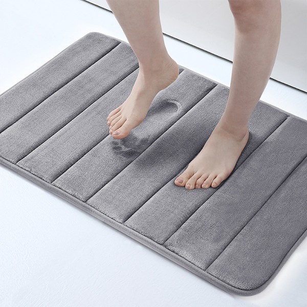 Tjockare badrumsmatta i korall sammet med memory foam