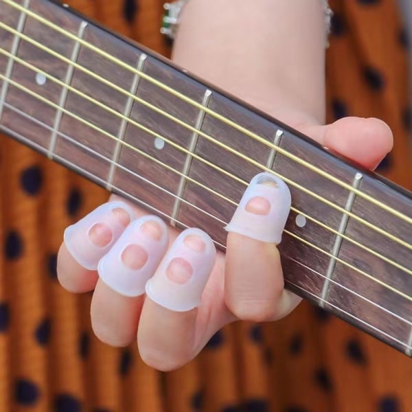 8 stycken gitarrfinger skydd i silikon, halkfria finger skydd för