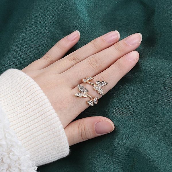 3 justerbare strikke ringe med sommerfugl