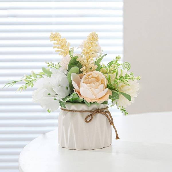 Konstgjorda krukväxter, liten keramisk vas, konstgjorda blommor