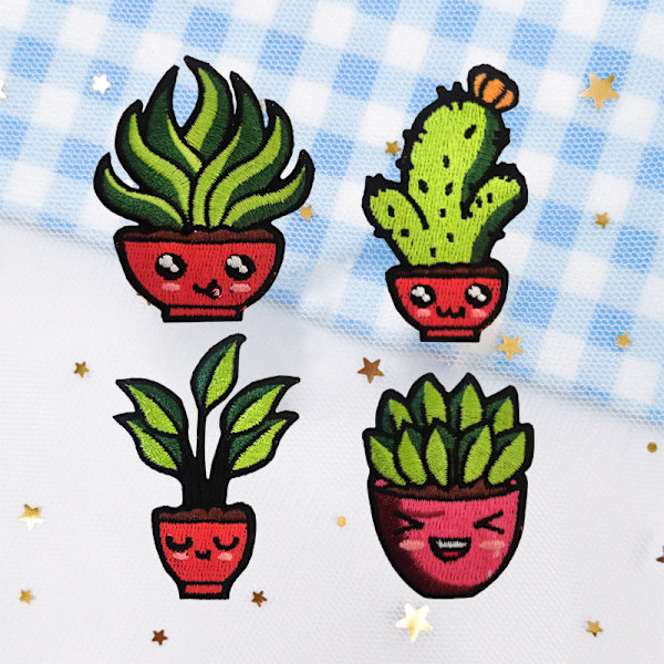 9 stryge-på broderede mærker med søde potteplante designs til
