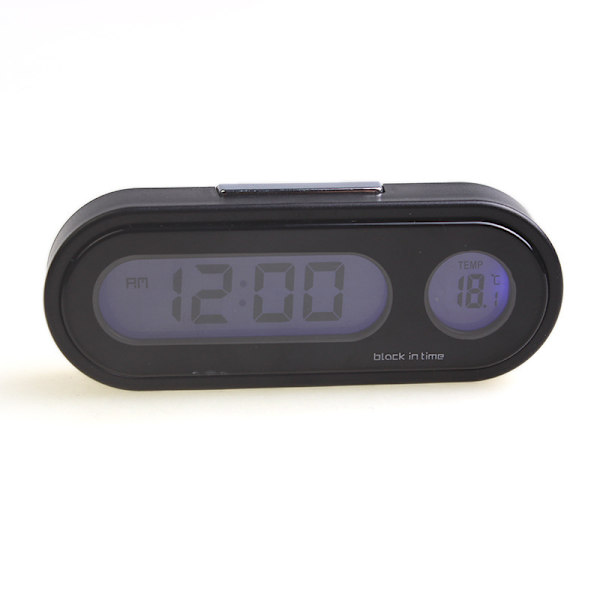 1 svart bilinredning, termometer, klocka, digital