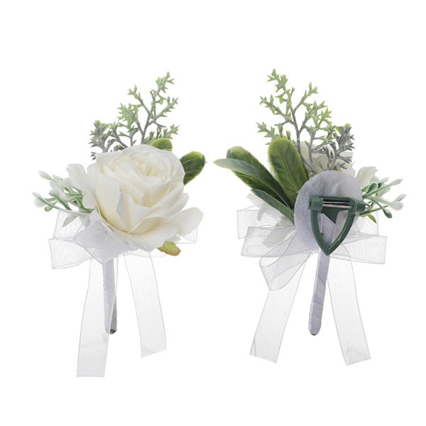 Vit roskorsage för handleden och herr corsage bröllopsblommor