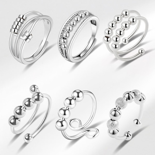 Kvinnors ångestlindrande ring svängbar ring med pärlor justerbar