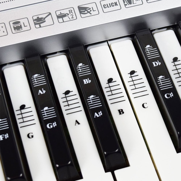 Piano och tangentbord musik not, komplett set med klistermärken för vita och svarta tangenter; genomskinliga och borttagbara