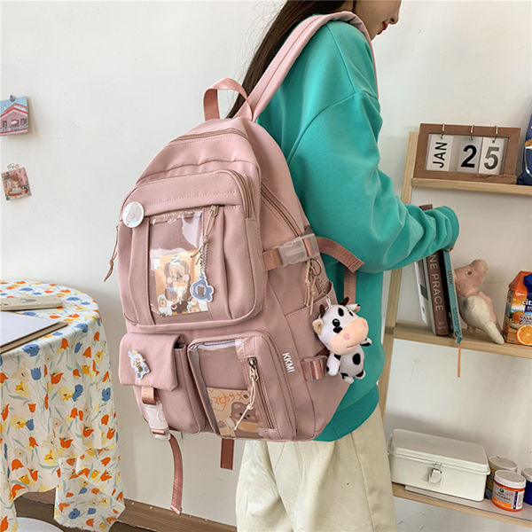 Suurikapasiteettinen reppu, matkustamiseen tarkoitettu reppu, jossa on useita taskuja aikuisille, teini-ikäisille ja lapsille, vaaleanpunainen pink