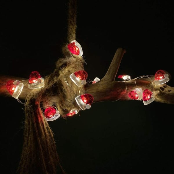 Juldekoration tomteluva ornament handmålad ljus stri