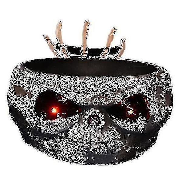 Halloween-makeiskulho hyppäävän luurangon kädellä, pelottava koriste