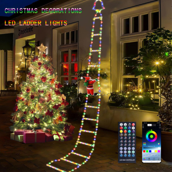 Juldekorativa LED-stegeljus med klättrande jultomte