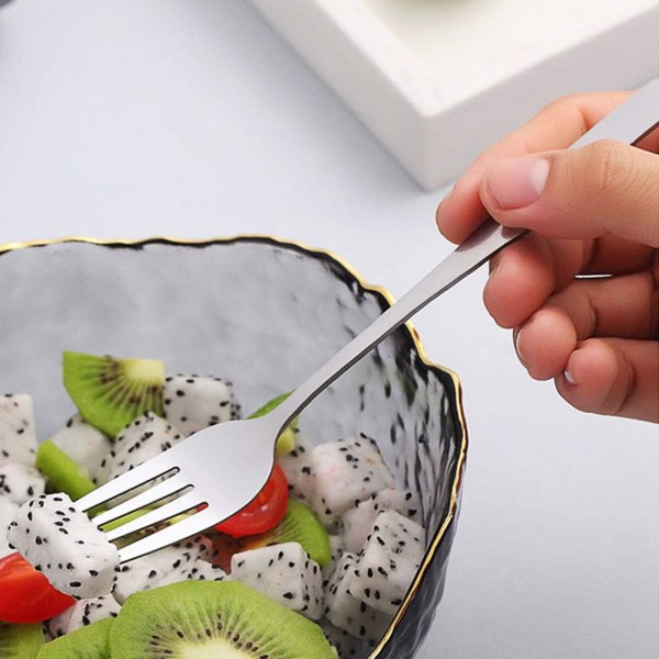Blandat set, soppskjeer i rustfritt stål og salatgafler.