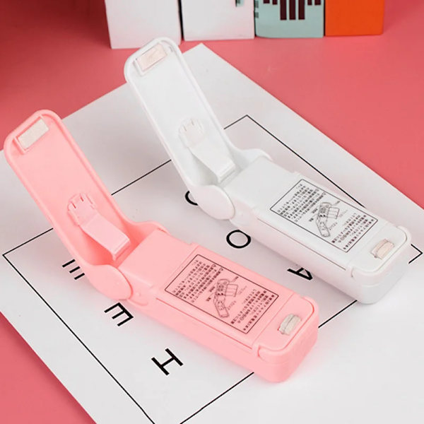 Minilamineringsmaskin Manuell forseglingstång Lodding Bærbar termisk Vakuumforsegling Plast Stängpose Matsparer Pink 01