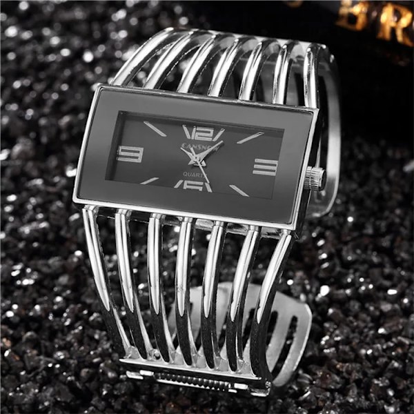 Mærke Dameklokker Damemote Armbånd Armbånd Kvartsstålklokke Watch Montre Presenter reloj mujer Relogio Feminino Silver Black