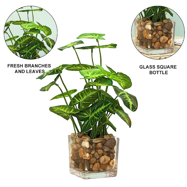 Glassflaske med kunstig plante i vintergrønn kløverdesign
