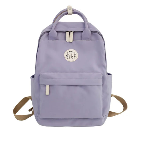 Liike- ja koulukäyttöön sopiva vedenkestävä reppu purple
