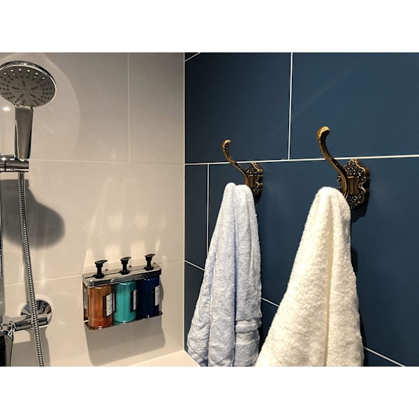 Set med 2 väggkrokar i antik mässing
