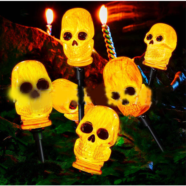 Halloweenin lattiavalaisimet, kalloja ja luita, puutarhavalot, naru l