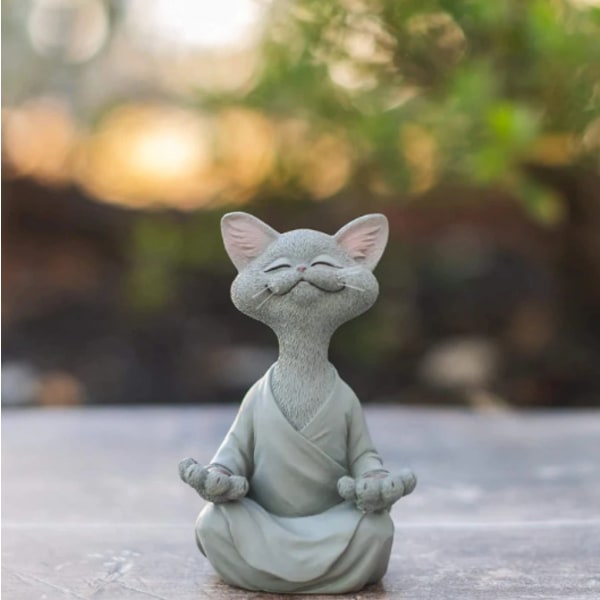 Iloinen kissa jooga meditaatio, Zen kissa rento asento veistos