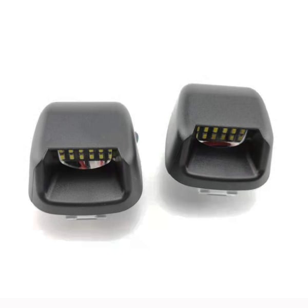 Navara D40 2004-2018 LED-nummerpladelys - direkte pasform alternativ black