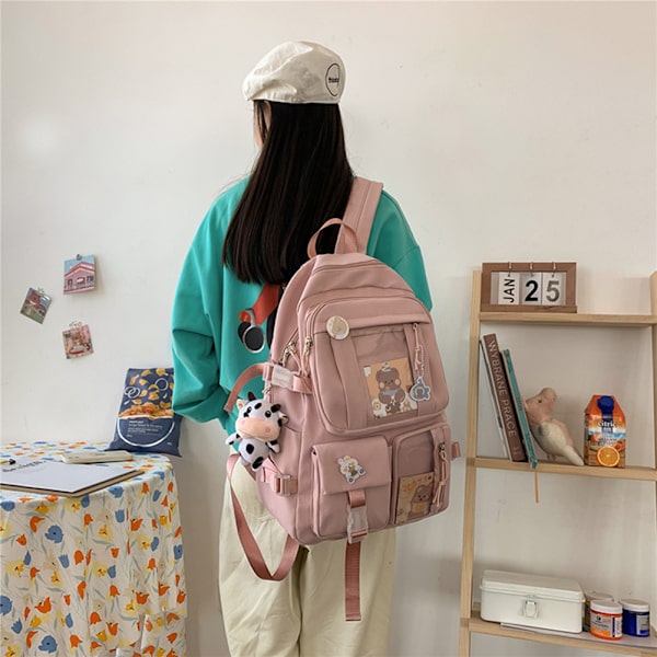 Suurikapasiteettinen reppu, matkustamiseen tarkoitettu reppu, jossa on useita taskuja aikuisille, teini-ikäisille ja lapsille, vaaleanpunainen pink