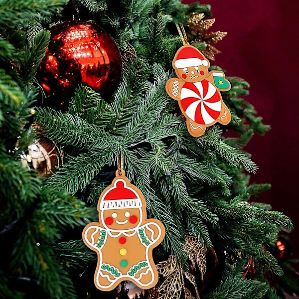 Festlige pepperkakemenn, miniatyr juledekor med forskjellige mønstre for juletre, festdekor og gaveutdeling, slitesterk myk PVC, sett