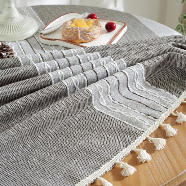 Rund bordsduk i polyester med tofsar, maskintvättbar, 140 cm, grå