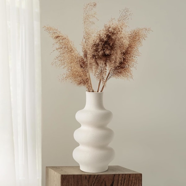 Beige vase lavet af keramisk blomster vase moderne med donut design