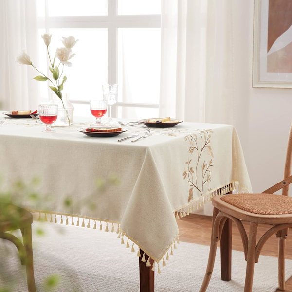 Bomullslinduk for spisestue, brun bladformet duk med beige dusker