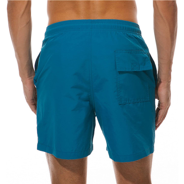 Miesten uimahousut Quick Dry -rantashortsit taskuilla. Peacock Blue