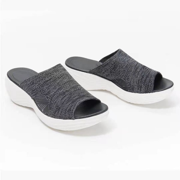 Dametøfler med flatbunnet netting som puster. black 39